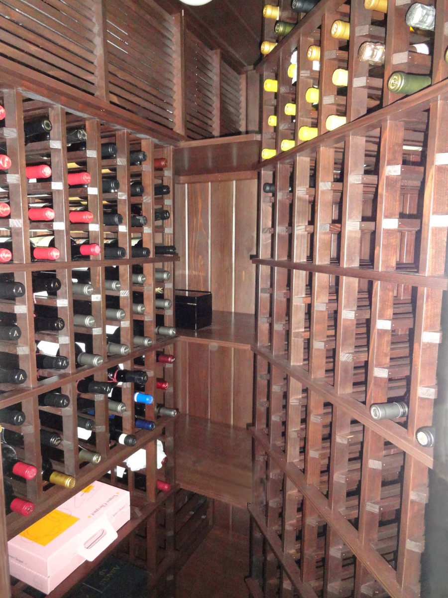 Small closet custom wine cellar was built in less than a 4ft x 4ft space