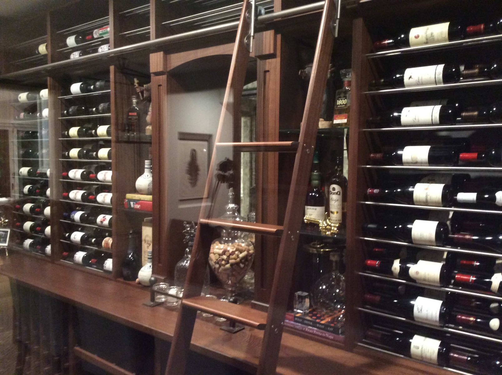 Wood and metal for the wine racks with glass door