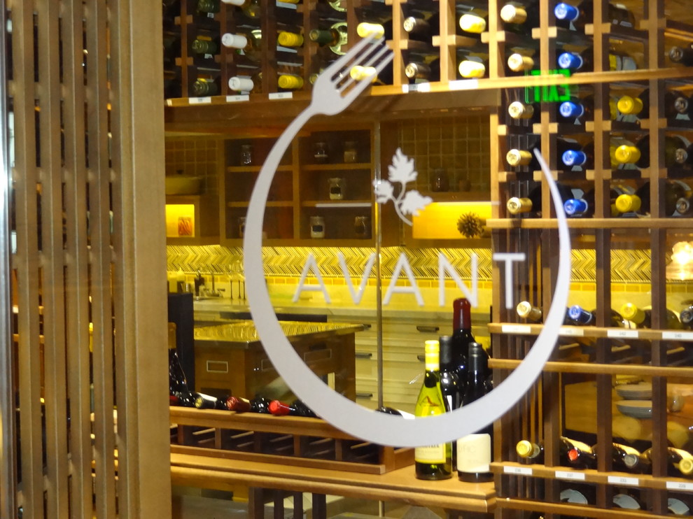 Avant Restaurant logo etch into the glass