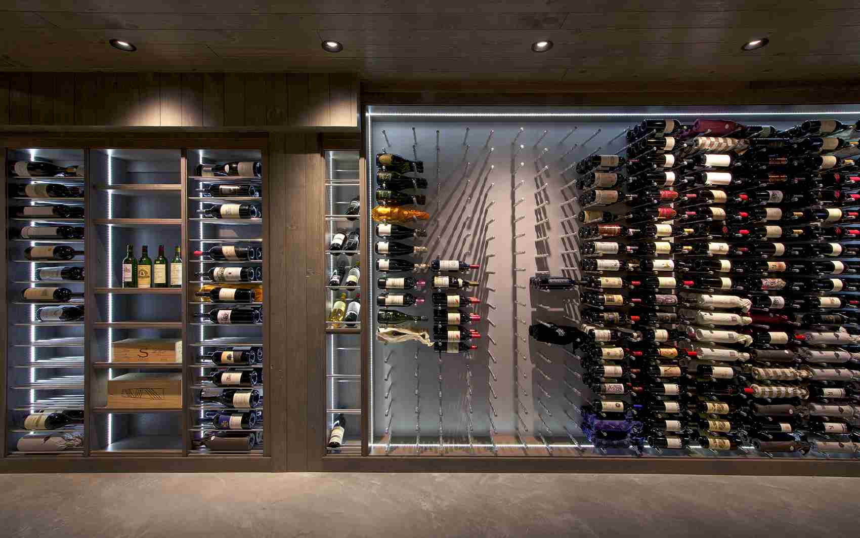 Custom wine racking is made from mixtures of metal, acrylic, and wood