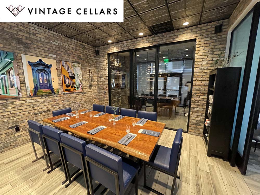 restaurant dining area with wine cellar view