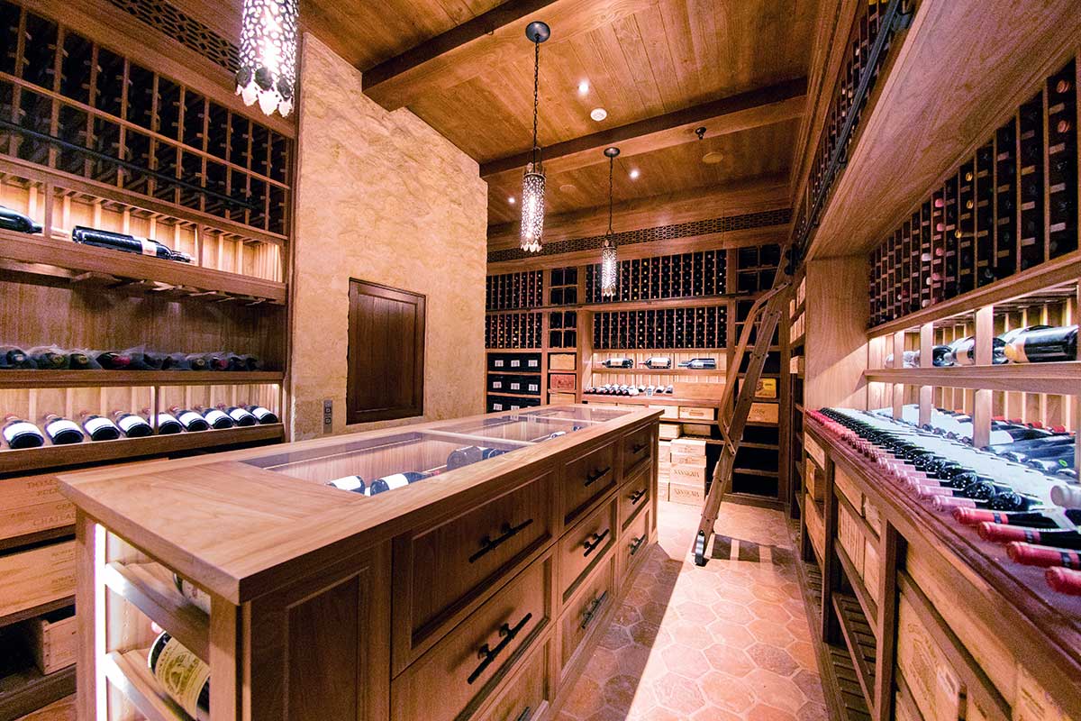 The racking in this 3000-bottle cellar was constructed entirely out of black walnut with a clear finish and is inspirational