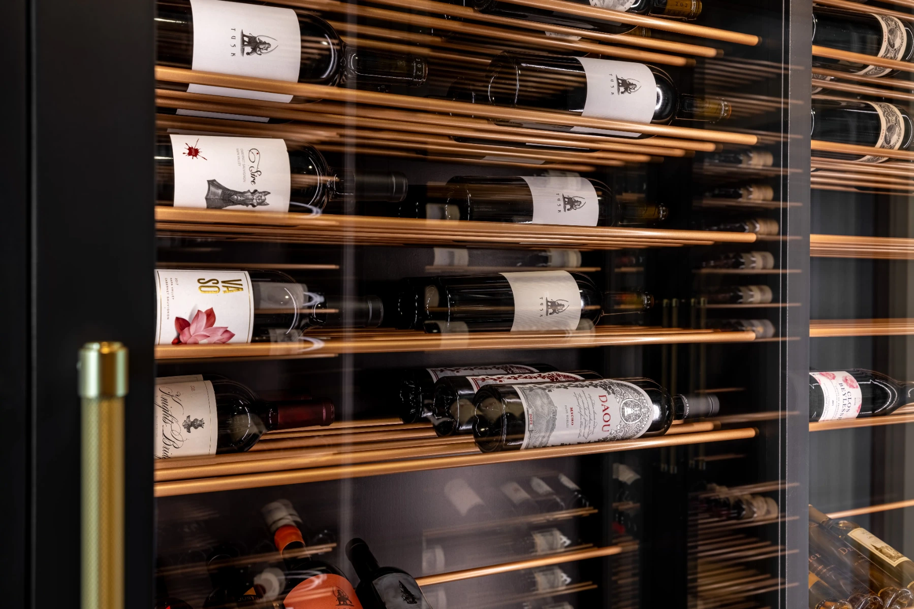 Triple-deep VintageView wine racks in a La Jolla hallway wine cellar