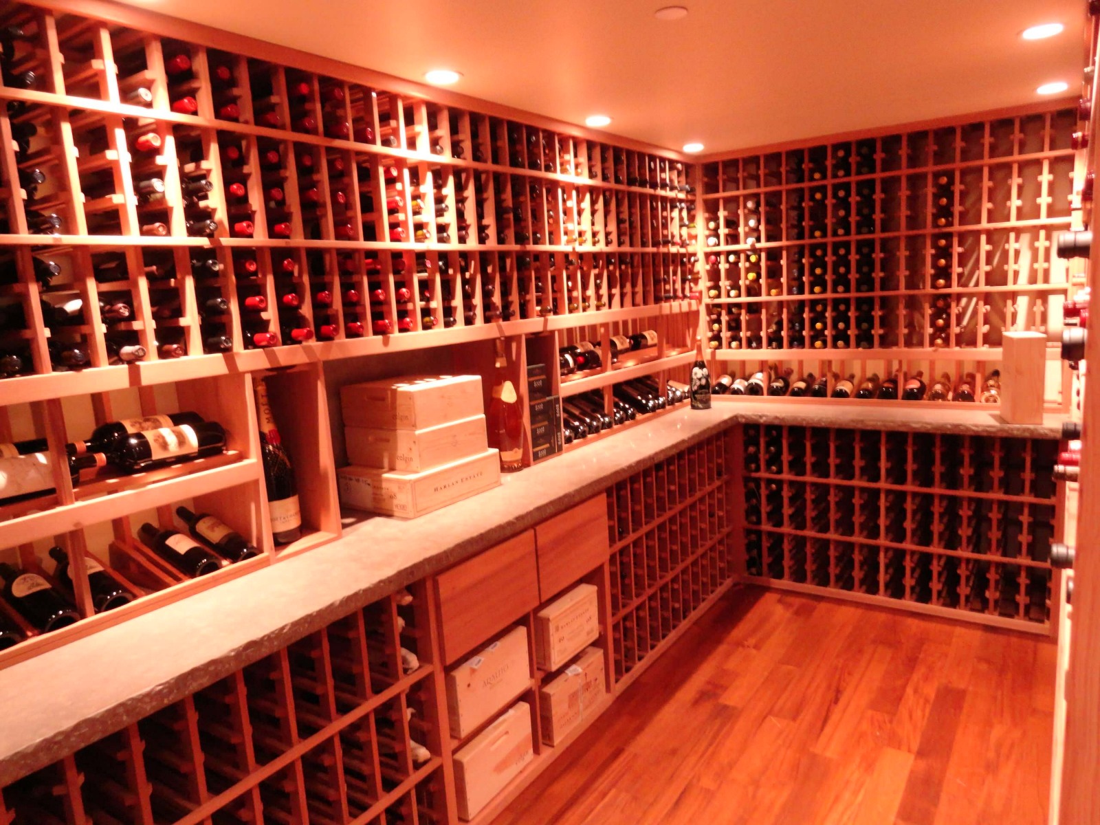 Large amount of bottle storage with minimal wine displays and case storage