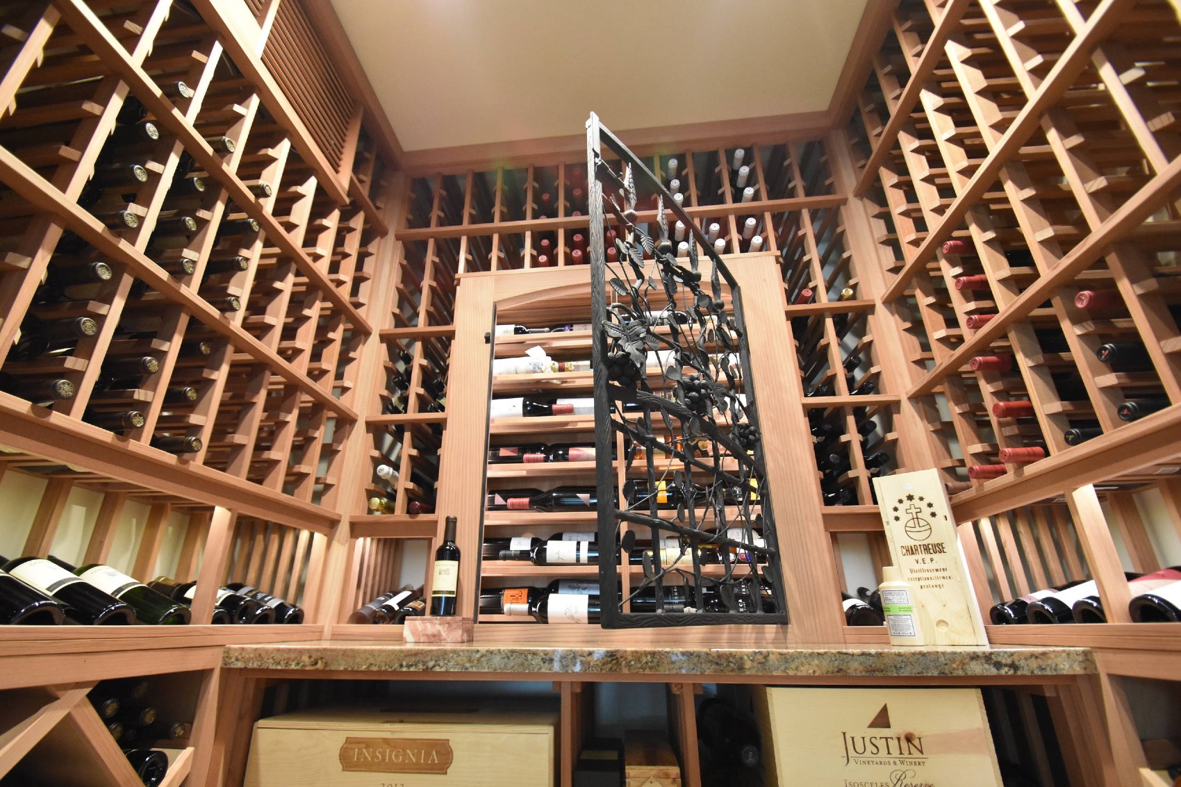 Second view of Laguna Hills Orange County Small Custom Wine Cellar with Wrought Iron Door
