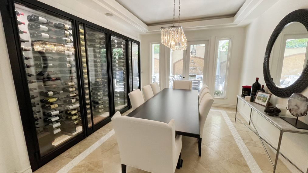 California Contemporary Dining Room Wine Cellar Equipped with a Reliable Wine Cooling Unit
