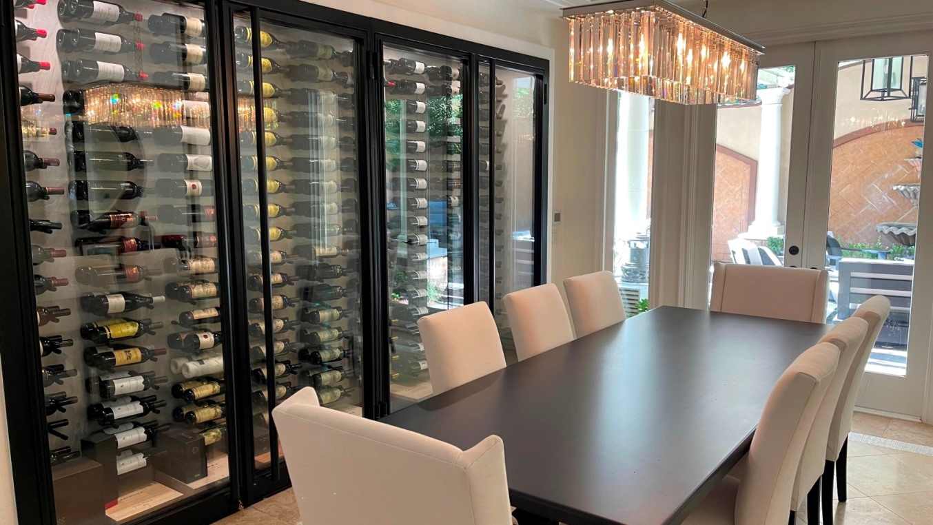 Glass Wine Cellar Doors Add a Contemporary Feel to this Home Wine Cellar