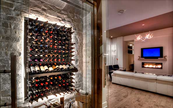 Beverly Hills Ultra Modern Wine Cellar with Metal Pegs, Backlighting, and Stone